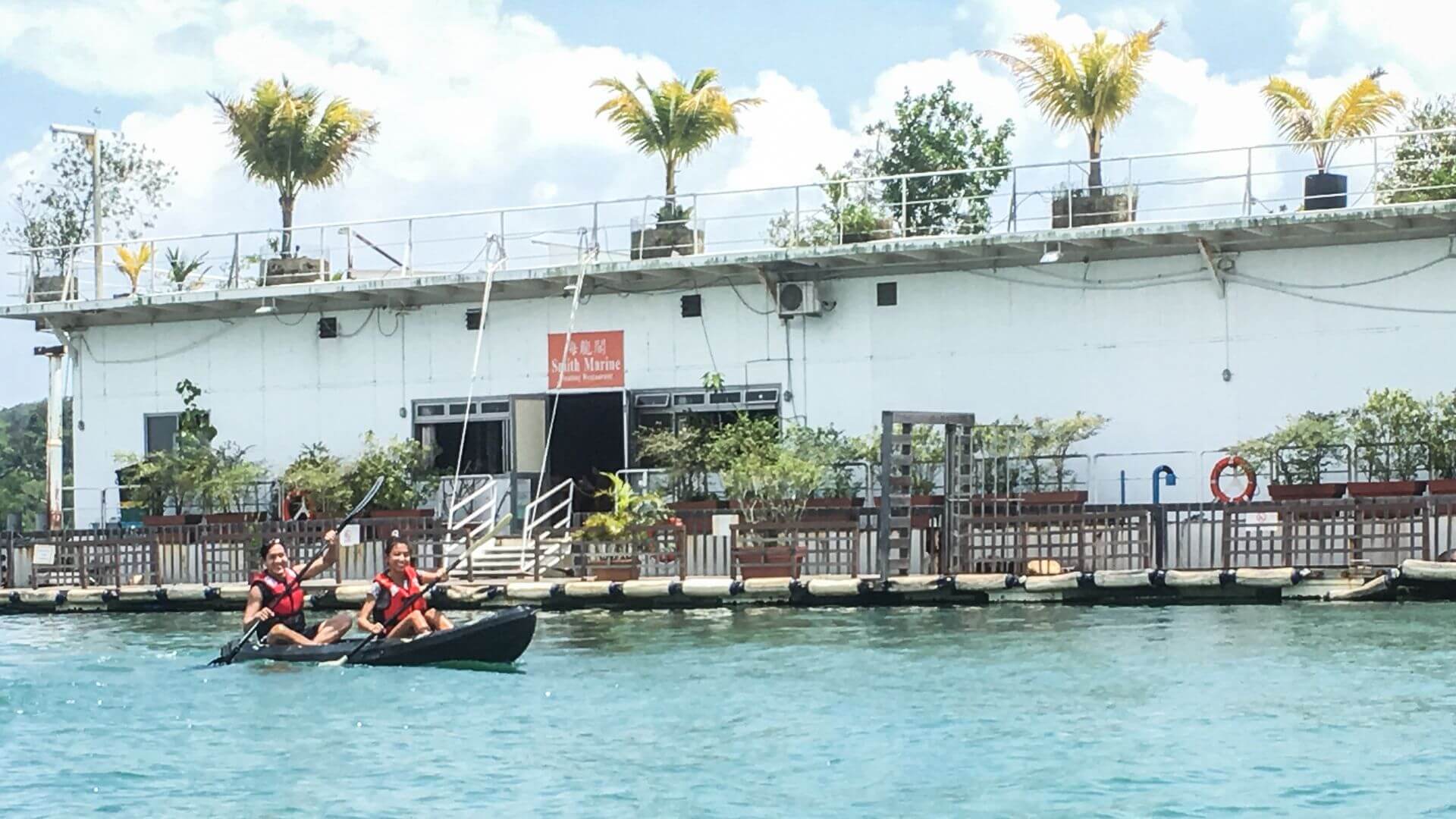 A couple enjoys kayaking activity at D'Resort Singapore