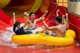 A group of friends enjoying water rides at Wild Wild Wet water theme park Singapore